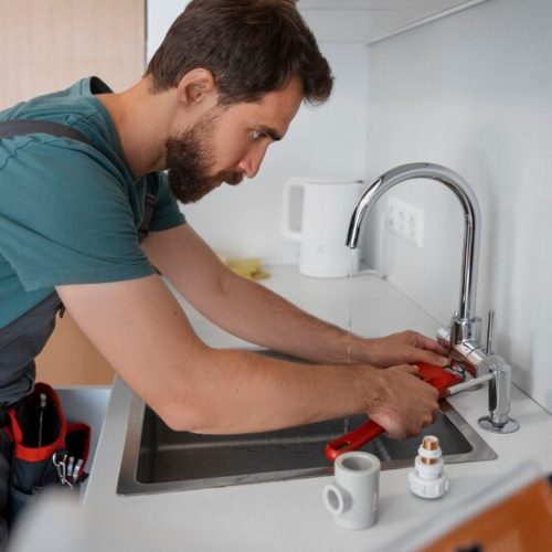 side-view-man-working-as-plumber_23-2150746307