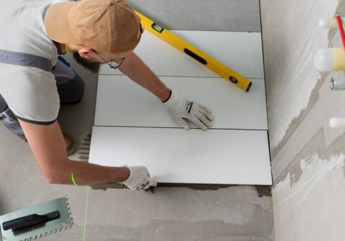 tiler-working-renovation-apartment_23-2149278631